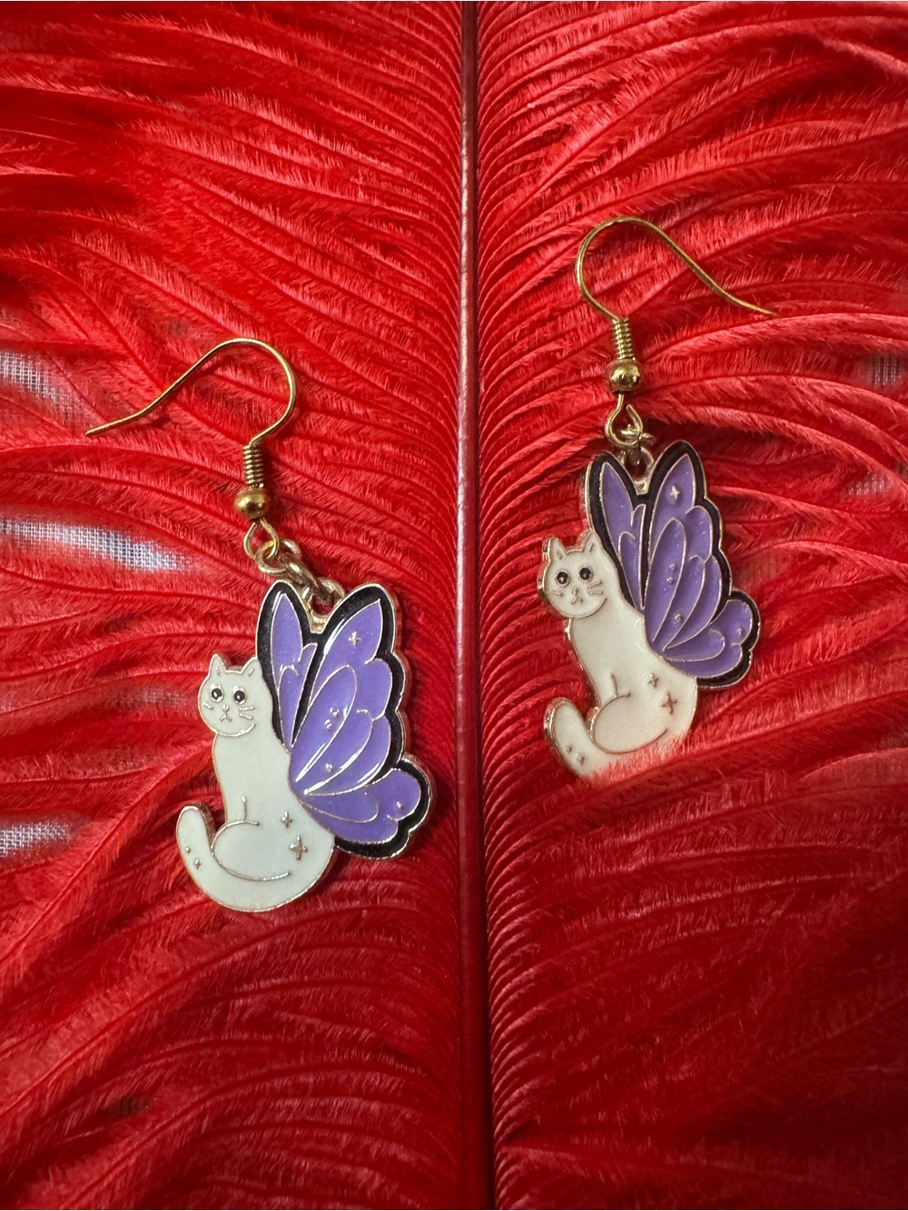 Charming Heaven must be missing an Angel Purple Winged dangle Cat Earrings -NWT